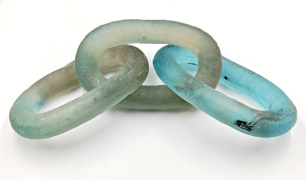 - a , glass Sculpture by Amy Whittingham, measuring 13 x 40 cm (H x W) £895